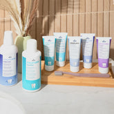 Close-up of DR. Wild Emoform Pure & Fresh Toothpaste being applied to toothbrush – gum care and fresh breath